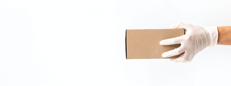 Concept of safe package delivery against Coronavirus 2019-nCov in a pandemic.